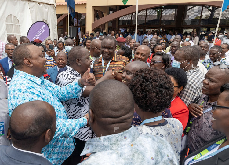 President Uhuru Kenyatta and Interior CS Fred Matiang'i interacts with school principals and education stakeholders attending the 45th Kenya Secondary Schools Heads Association (KESSHA) annual conference at Sheikh Zayed Hall in Mombasa County.