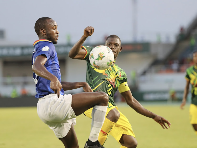 Peter Shalulile of Namibia is challenged by Hamari Traore of Mali during their Africa Cup of Nations match at Laurent Pokou Stadium on Wednesday.