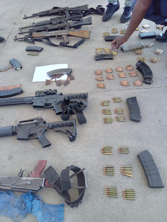 Some of the weapons seized after the taxi-related shootout.