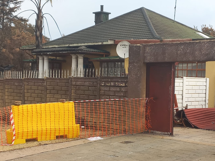 A garage door blown away in the explosion on Saturday in Boksburg.