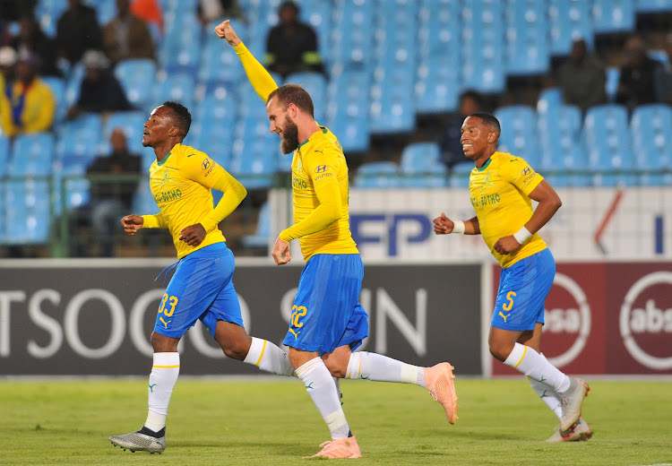 Mamelodi Sundowns striker Jeremy Brockie celebrates with teammates Lebohang Maboe (L) and Andile Jali (R) after scoring his first official goal for Downs during an Absa Premiership encounter at home to Free State Stars at Loftus Versfeld on November 7, 2018.