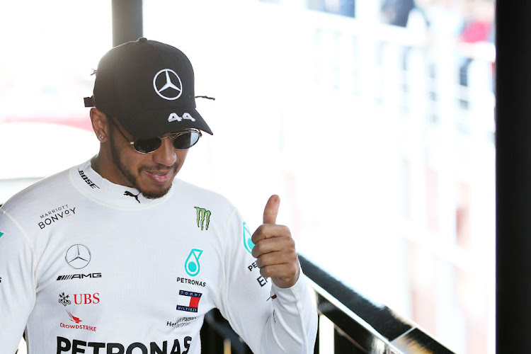 Lewis Hamilton of Great Britain and Mercedes GP greets fans in the Paddock during day three of F1 Winter Testing at Circuit de Barcelona-Catalunya on February 21 2020 in Barcelona, Spain.