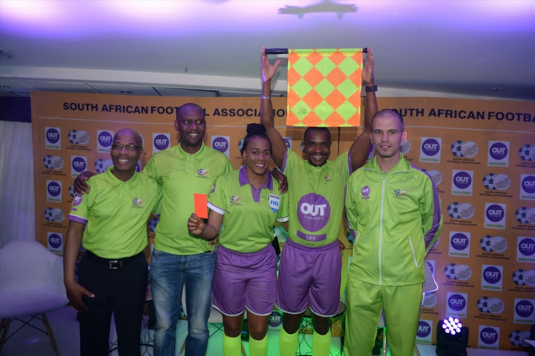 Former top SA referee Enoch Molefe, Victor Hlongwane, SAFA Female referee Akhona Makalima, Zakhele Siwela and Victor Gomes during the OUTsurance Sponsorship Announcement of SAFA Match Officials at SAFA House on September 11, 2018 in Johannnesburg, South Africa.