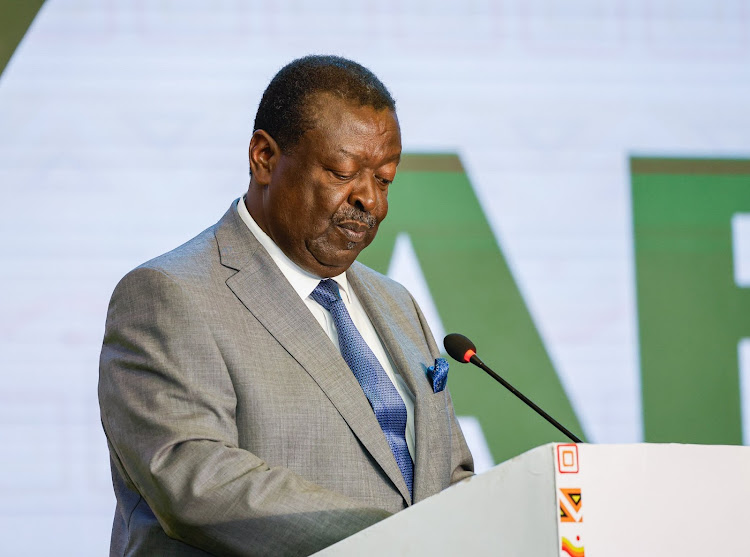 Prime Cabinet Secretary and CS for Foreign and Diaspora Affairs Musalia Mudavadi reading a speech at the African Reparations Conference in Accra, Ghana on November 14, 2023