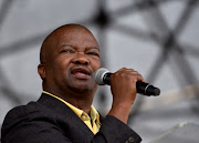 United Democratic Movement (UDM) leader Bantu Holomisa addresses the audience during an event to commemorate the sixth anniversary of the Marikana massacre on August 16, 2018 in Rustenburg,
