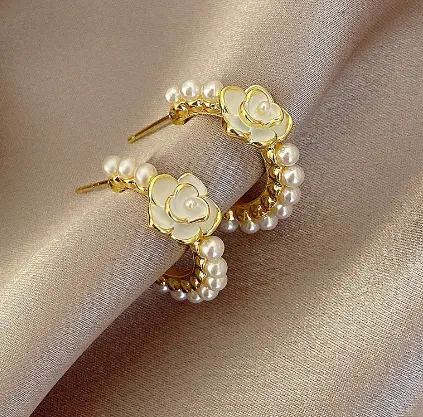 Boucles d'oreilles en argent sterling avec strass pour femmes, nouveaux clous d'oreilles élégants, simples et fleuris.