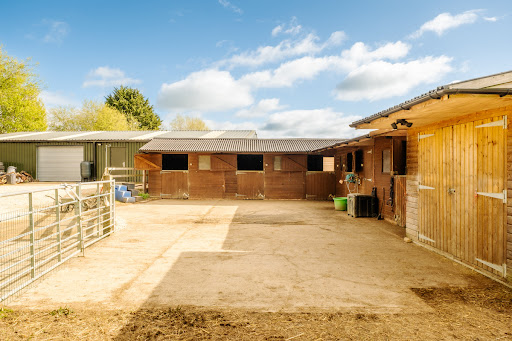 wooden stables, courtyard in this luxury farmhouse for sale in Shipston-on-Stour ($2,895,681)