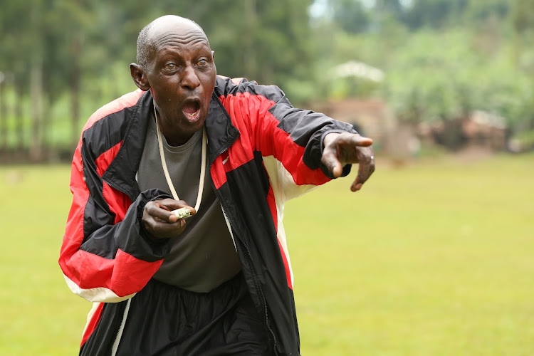 Retired athlete Peter Kianga issues gestures during a trainig session at Kiandege athletics training camp in Nyamira