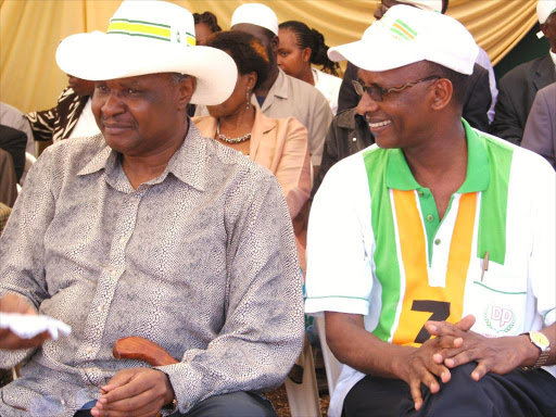 Former Democratic Party Secretary General Chris Murungaru (left), and Organizing Secretary Jacob Haji at Embu.