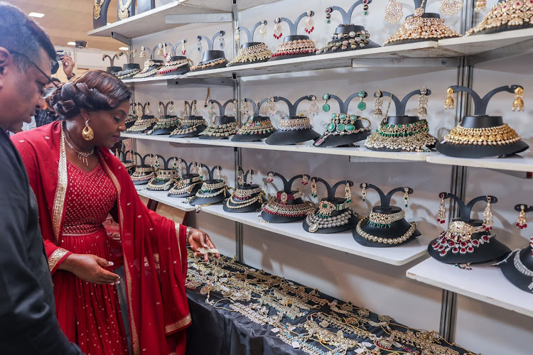 Second Lady Pastor Dorcas Rigathi looking at items on display during the ‘UUF Labels Fashion Show 2024’, at Oshwal Centre, Nairobi.