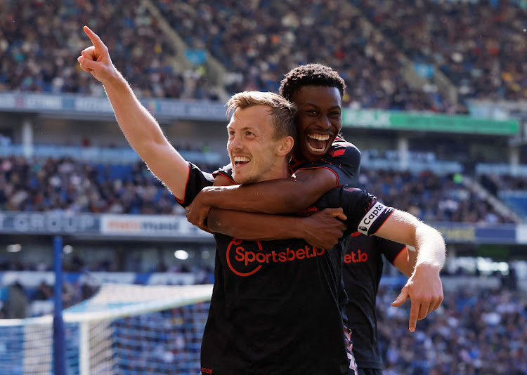 Southampton's James Ward-Prowse celebrates with Nathan Tella after against Brighton