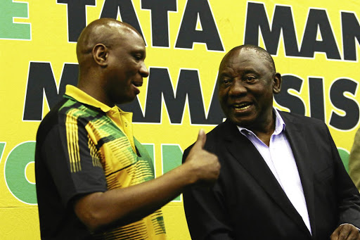 ANC leader and deputy minister Zizi Kodwa and President Cyril Ramaphosa .