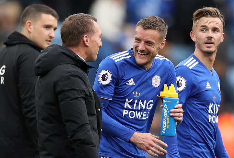 Leicester City manager Brendan Rodgers, Leicester City's Jamie Vardy and James Maddison celebrate after the match