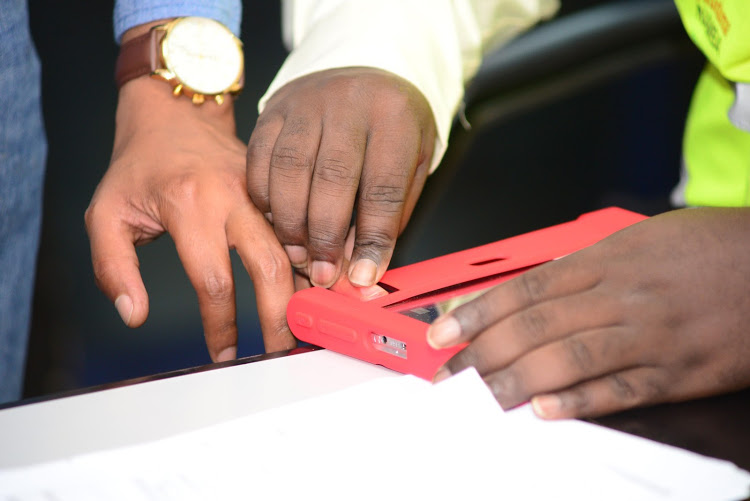 The Huduma Namba officers will take fingerprints of your child and you separately.