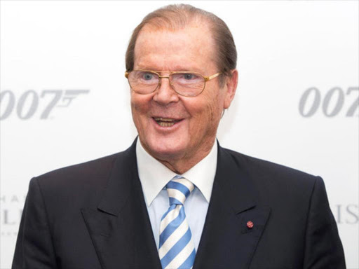 Actor Sir Roger Moore attends the 50 Years of James Bond Auction at Christies in London, October 5, 2012. REUTERS