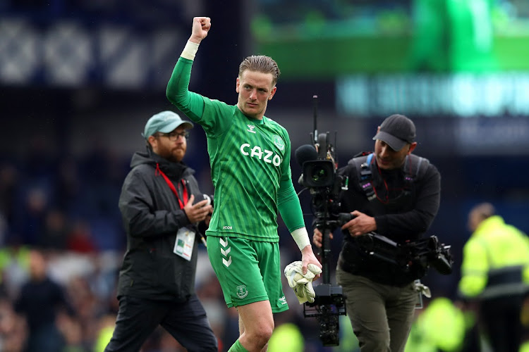 Jordan Pickford of Everton interacts with the crowd as they celebrate their side's win after the final whistle of the Premier League against Chelsea at Goodison Park in Liverpool on May 1 2022.