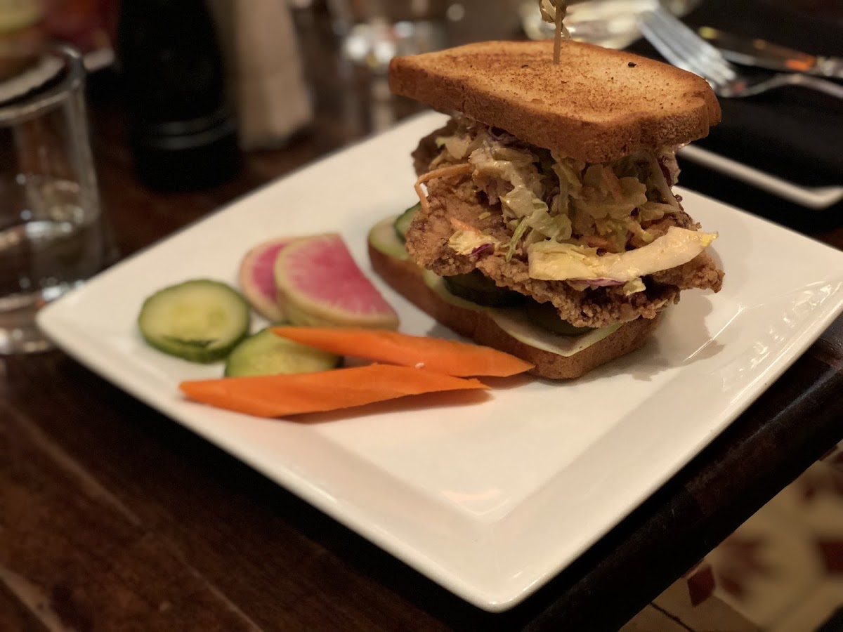 Gluten free fried chicken sandwich with fennel slaw and spicy mayo.