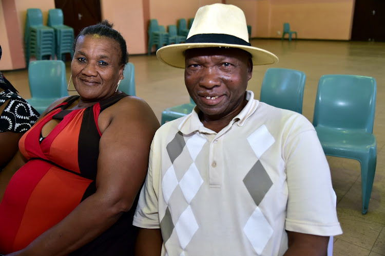 Nobahle Babase, left, and Sydney Patu share the birthday celebration for two Ward 21 residents turning 100 and 101 at Daku Hall in Kwazakhele on Tuesday