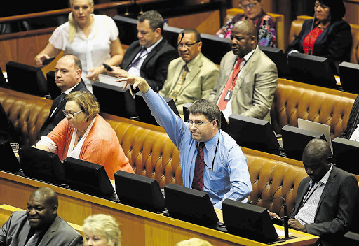 SHOWER POWER: Democratic Alliance MP David Maynier points out President Jacob Zuma's repeated absence from Q&A sessions in the National Assembly in Cape Town