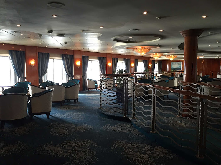 The newly remodeled Ocean Bar on Prinsendam features a bar and dance floor on deck 3.