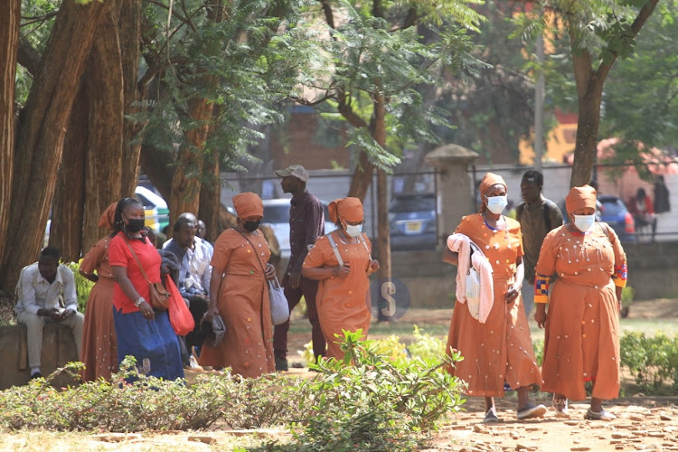 Kenyans don traditional regalia making their way into Jevanjee gardens ahead of Azimio prayer rally on February 22.