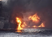 Iranian oil tanker Sanchi is seen engulfed in fire in the East China Sea, in this January 13, 2018 picture provided by Shanghai Maritime Search and Rescue Centre. 