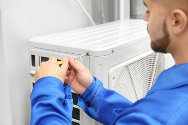 hvac technician installing ac