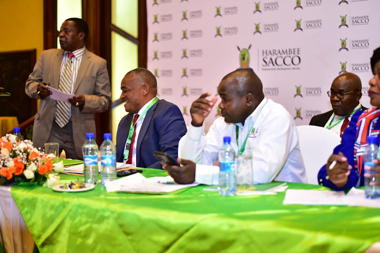 Harambee Sacco chairman Macloud Malonza with Harambee Sacco CEO George Ochiri during the Sacco's Annual Delegates Meeting on February 20,2023.