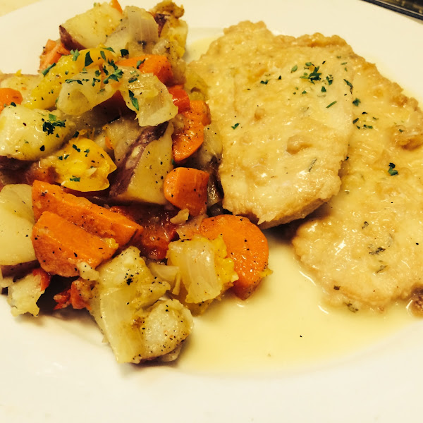 Chicken Francese over potato and roasted vegetables