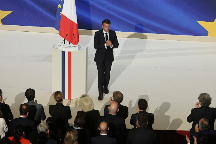 French President Emmanuel Macron gestures at the end of his speech on Europe in the amphitheatre of the Sorbonne University in Paris, France, April 25 2024. Picture: Christophe Petit Tesson/Reuters