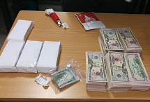 Almost R2-million in US dollars was found hidden in the luggage of a man flying from Cape Town to Dubai.