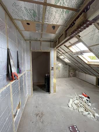 Frame out and plasterboard & skim album cover