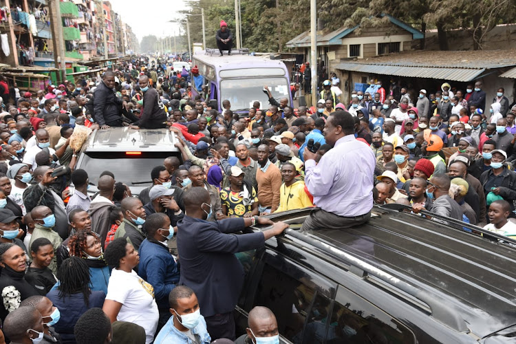 ANC leader Musalia Mudavadi addressing Mathare residents after attending a service at Ruaraka SDA Church in Nairobi