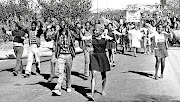 School children march through the streets of Soweto in 1976  to protest against the use of Afrikaans as a medium of instruction in black schools. The writer says  through education, employment and entrepreneurship today's  youth can be  a solution to African problems. /Bongani Mnguni