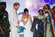 Prince Harry, Duke of Sussex, and Meghan, Duchess of Sussex visit Nigeria Unconquered, a charity organisation that works in collaboration with the Invictus Games Foundation, at a reception at Officers’ Mess on May 11, 2024 in Abuja, Nigeria. 