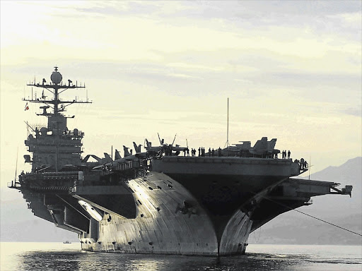 US aircraft carrier Harry S Truman has been repositioned as the US and other major powers weigh their options in the wake of the alleged chemical-weapons attack by Syrian President Bashar al-Assad's forces near Damascus last week