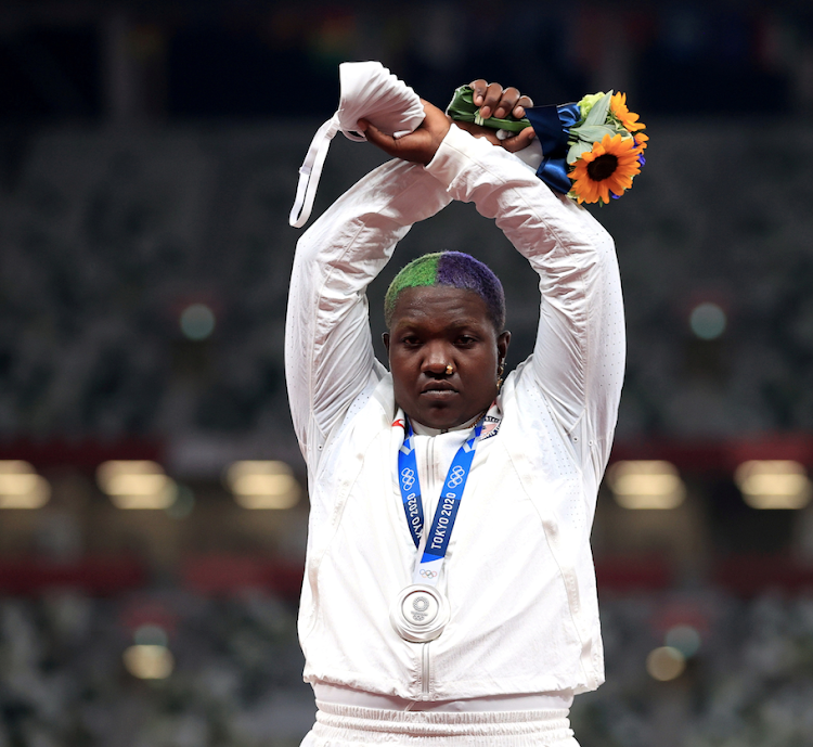 . Silver medallist, Raven Saunders of the United States gestures on the podium