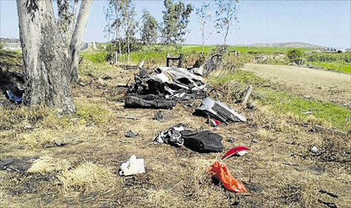 AFTERMATH: Fragments of the car left alongside the road after a accident in which a Fort Hare student survived his car exploding