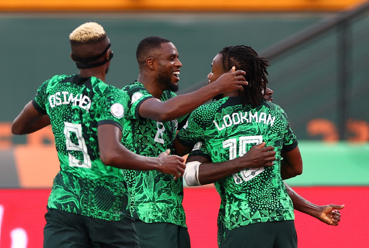 Nigeria's Ademola Lookman celebrates scoring their goal with teammates in the Afcon game against Angola.