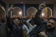 People react to a speech by former Prime Minister of Pakistan, Nawaz Sharif, at the party office of Pakistan Muslim League (N), at Model Town in Lahore on February 9 2024 in Lahore, Pakistan.