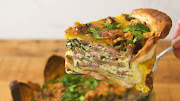 Bacon, mushroom and spinach quiche with a bread crust.