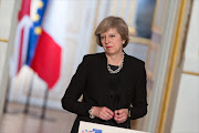 British Prime Minister Theresa May at a press conference in France.