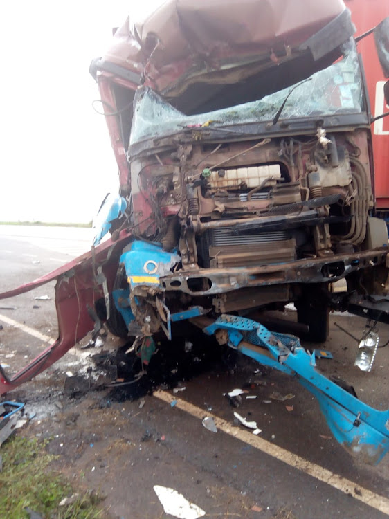 A damaged truck that was involved in an accident on Wednesday morning killing the driver and a turn boy