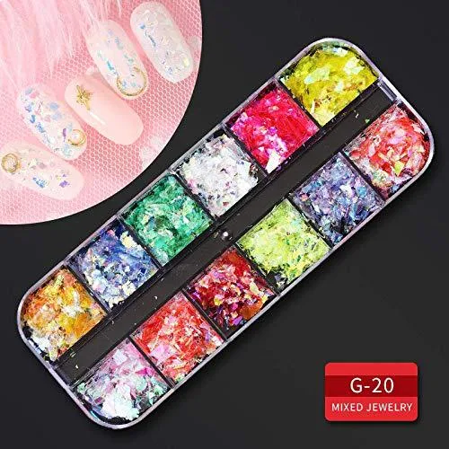Set gioielli per unghie con rivetti perle e conchiglie. Decora le tue unghie con stile e crea nail art uniche fai da te.