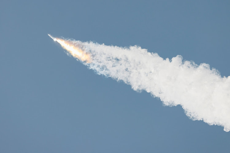 SpaceX's next-generation Starship spacecraft atop its powerful Super Heavy rocket lifts off from the company's Boca Chica launchpad on a brief uncrewed test flight near Brownsville, Texas.