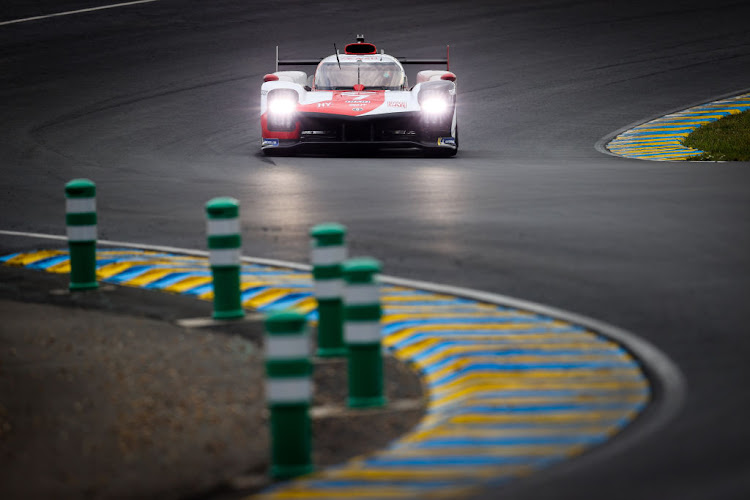 The #07 Toyota Gazoo Racing Toyota GR010 Hybrid of Mike Conway, Kamui Kobayashi, and Jose Maria Lopez in action during the 24 Hours of Le Mans.