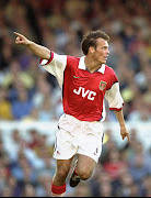 Fredrik Ljungberg of Arsenal celebrates a goal on his debut during the Premiership match against Manchester United on 20th September 1998 at Highbury in London