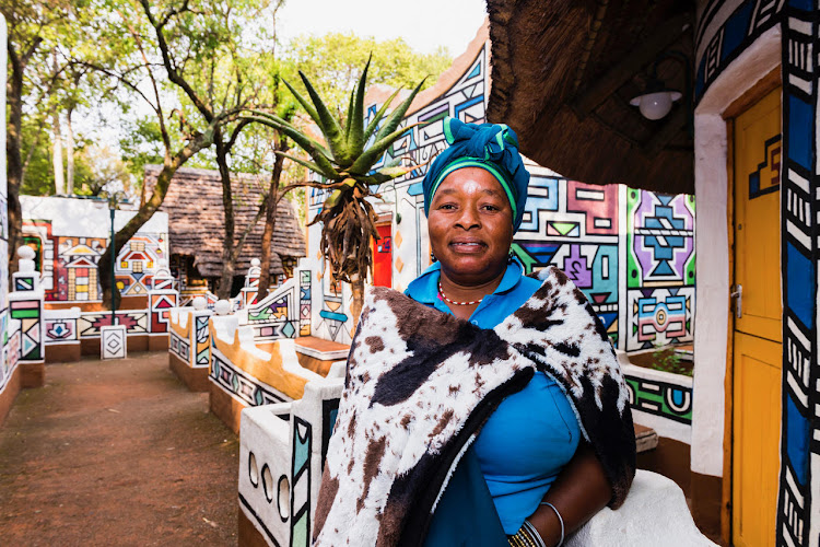 The Ndebele huts within Lesedi Cultural Village are a riot of colour.