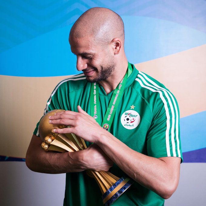 Algeria's Adlène Guedioura with the Africa Cup of Nations trophy