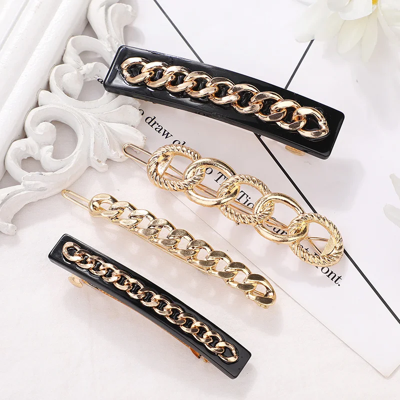 Barokke haarclip met ketting, legering verguld. Stijlvolle haaraccessoire, houdt je haar op zijn plaats, ideaal voor een elegante look bij speciale gelegenheden.